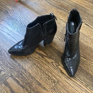 Vince Camuto heeled boots.